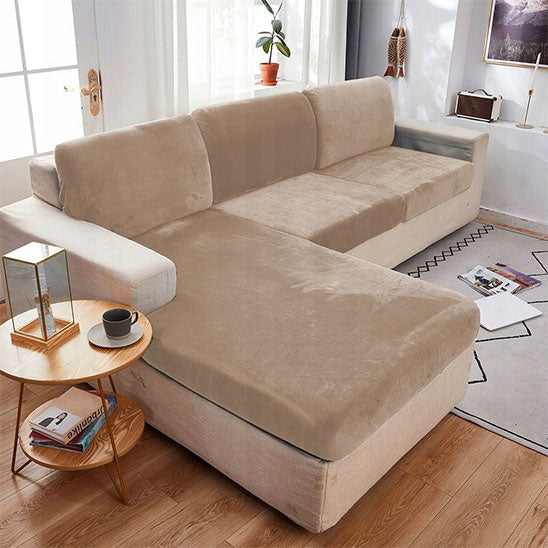 Housse canapé d'angle velours beige dans un salon